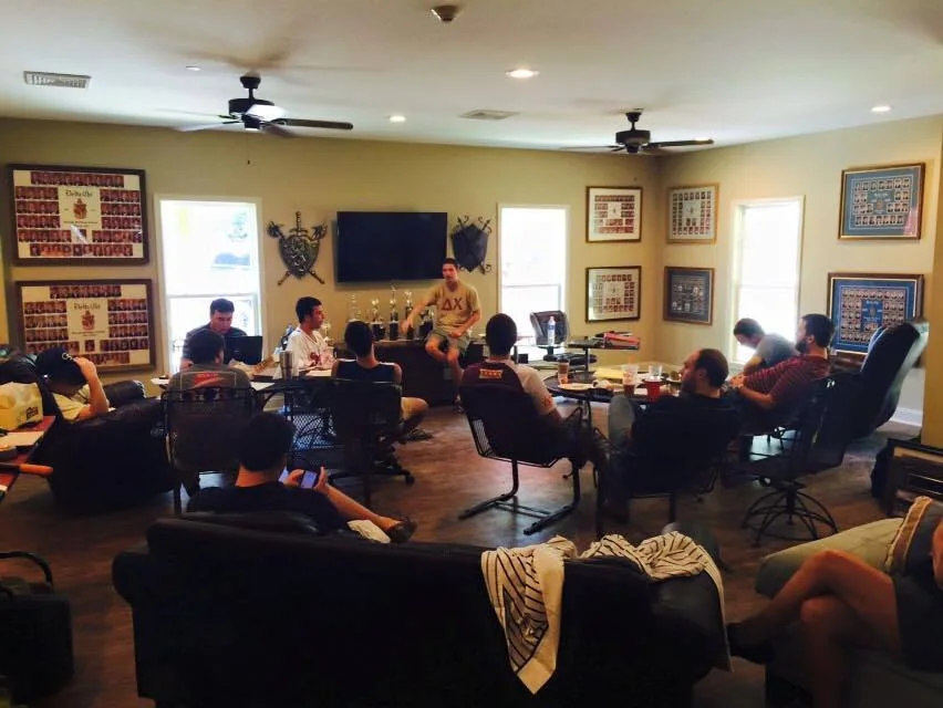 Delta Chi members in the chapter room during a workshop
