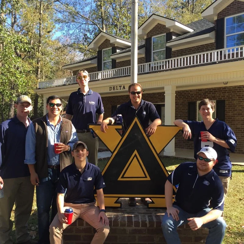 Delta Chi members at the chapter house before a Georgia Southern event